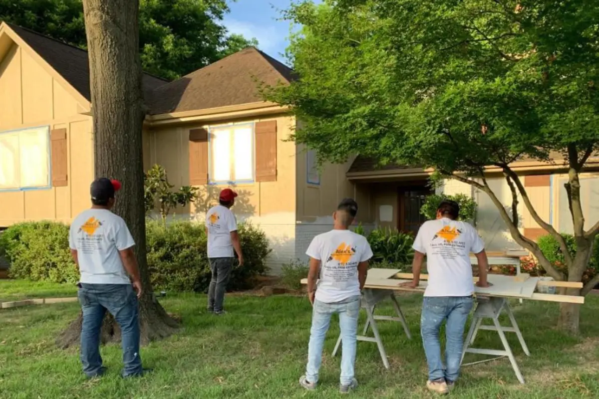 The Alex's Painting & Remodeling crew on a job site.